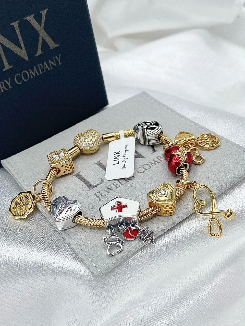 Linx Gold Snake Chain Charm Bracelet with Registered Nurse, Mom & Family Charms